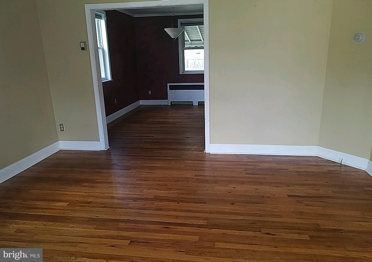 8539 Willow Oak Road Baltimore, MD 21234 - Photo 4 of 30 a view of a livingroom with wooden floor