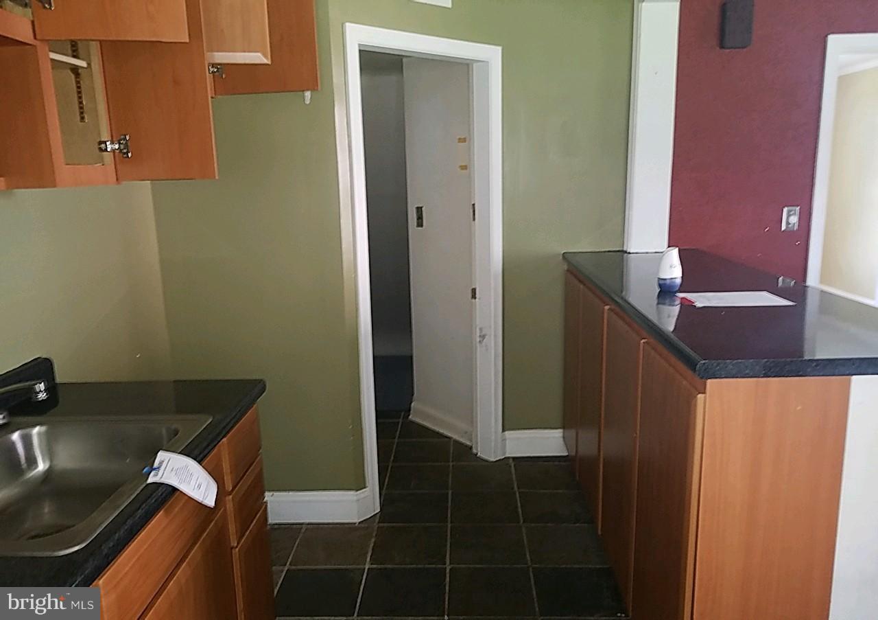 8539 Willow Oak Road Baltimore, MD 21234 - Photo 10 of 30 a bathroom with a sink and a mirror