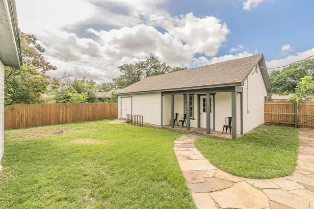 a view of a backyard with a garden