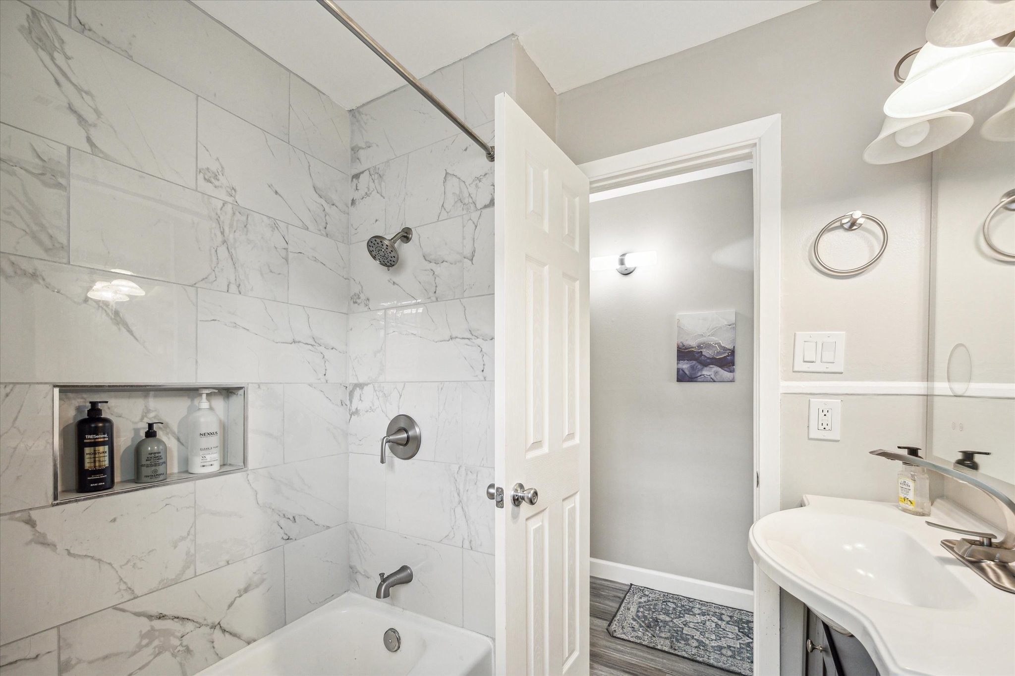 3808 Cochran Street Houston, TX 77009 - Photo 11 of 14 a bathroom with a sink toilet and shower