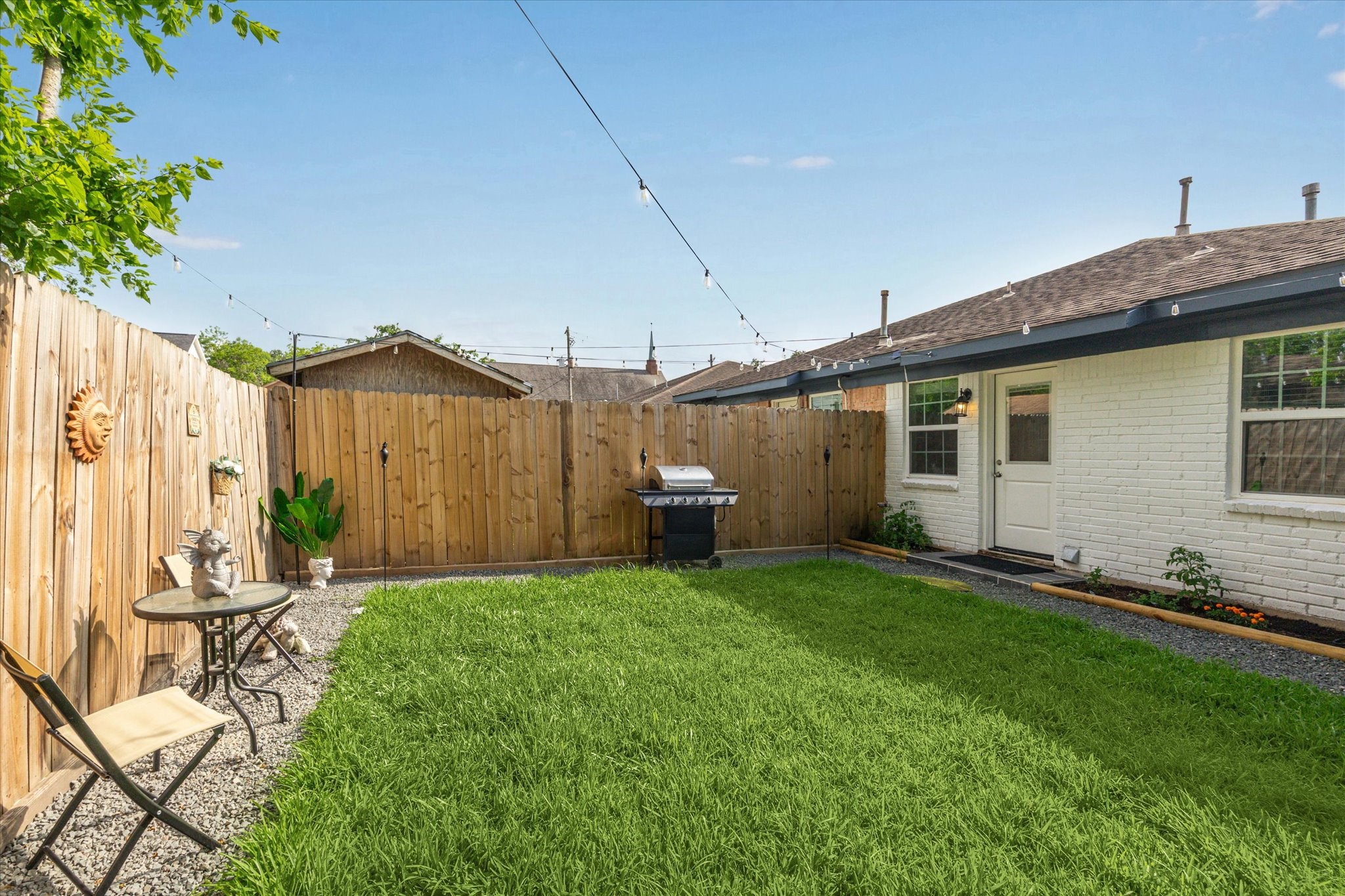 3808 Cochran Street Houston, TX 77009 - Photo 14 of 14 a view of a house with a backyard