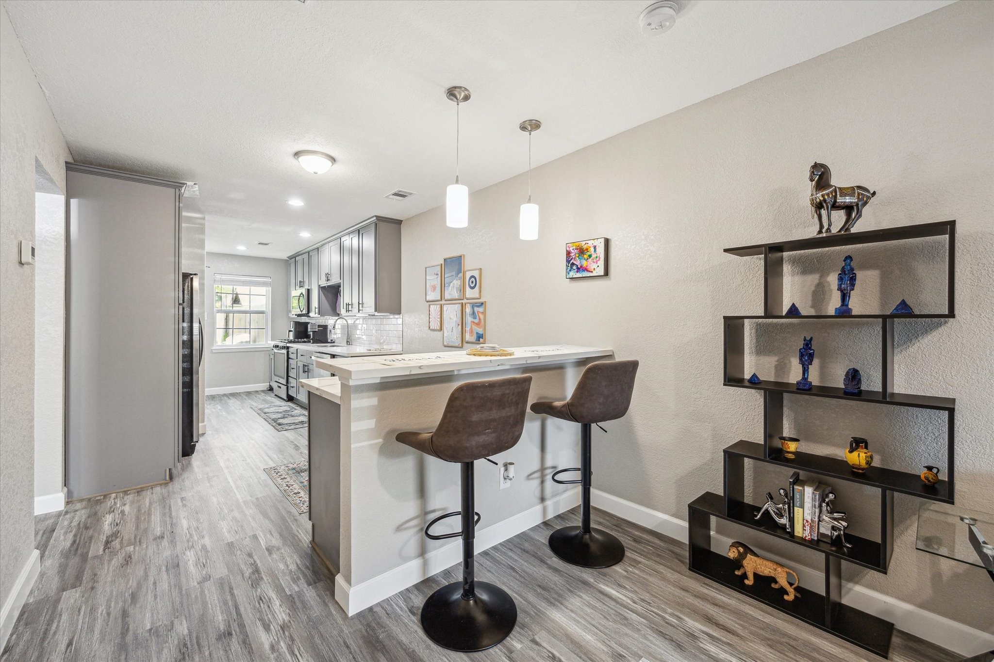3808 Cochran Street Houston, TX 77009 - Photo 5 of 14 a living room with furniture and a wooden floor