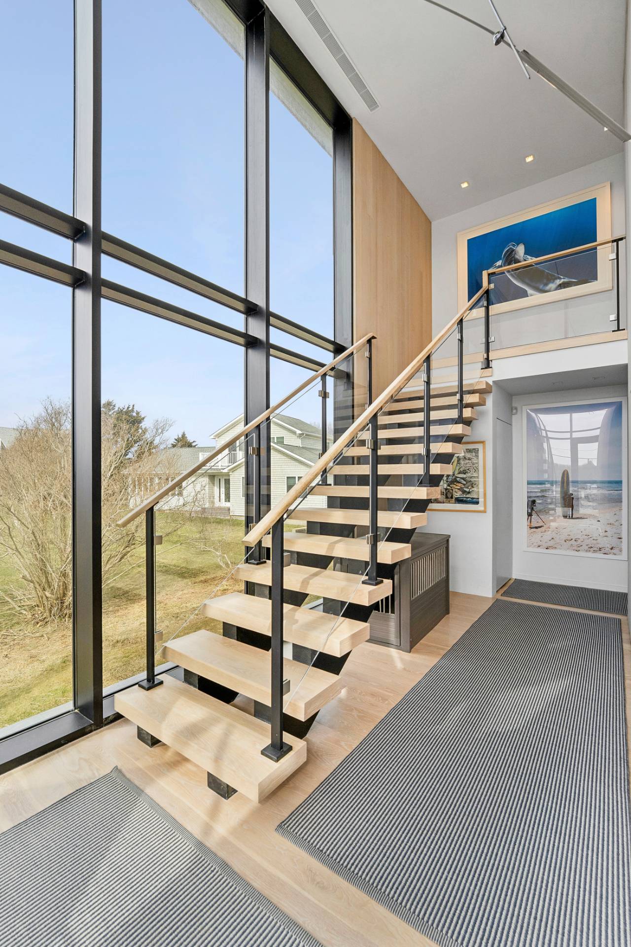 15 Deforest Road Montauk, NY 11954 - Photo 12 of 22 a view of staircase with furniture and window