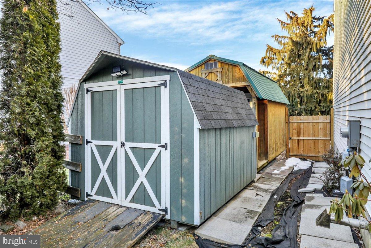 4020 Grant Street Reading, PA 19606 - Photo 48 of 49 Charming garden sheds in a serene setting.