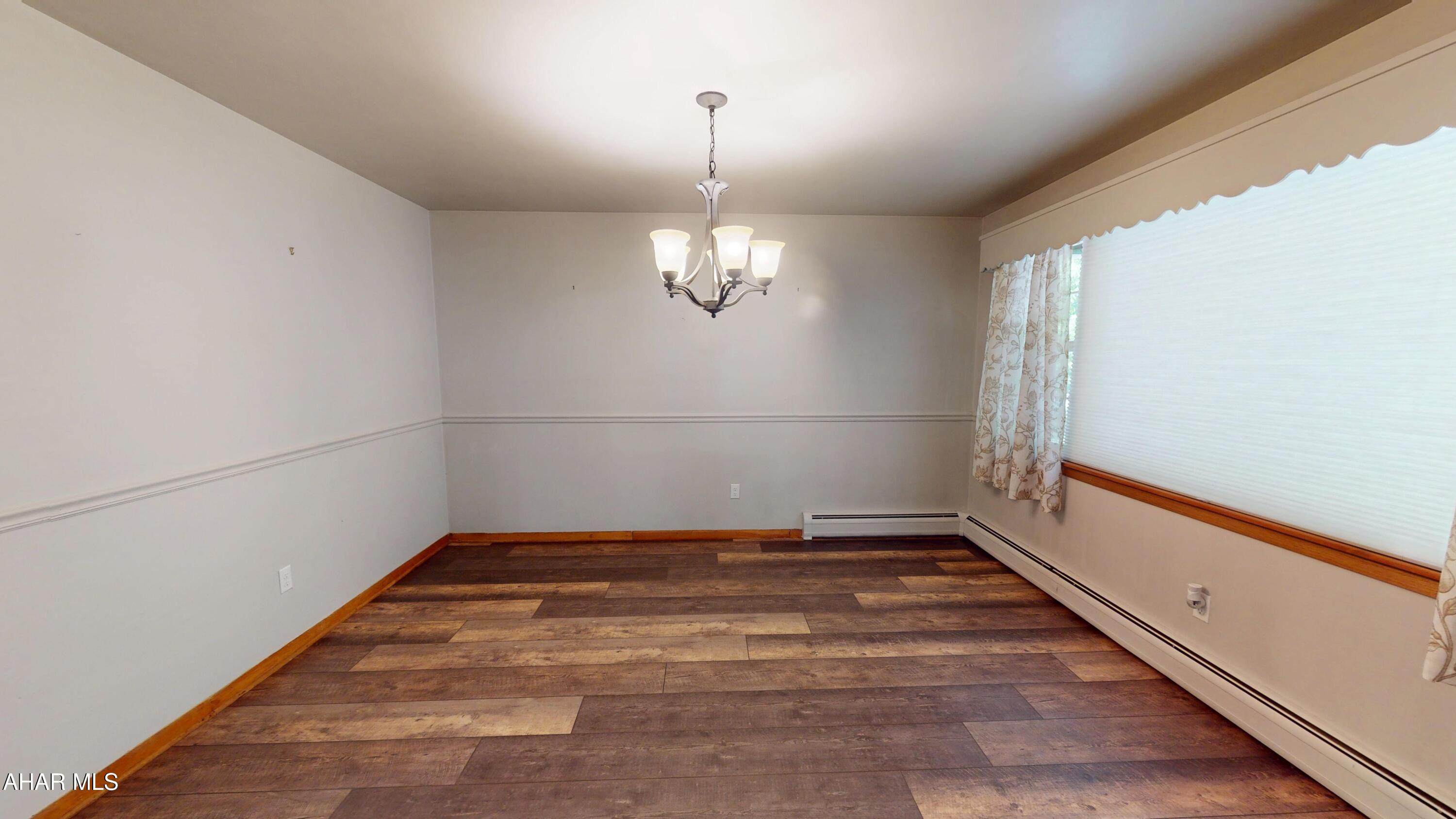 871 Decker Hollow Road Tyrone, PA 16686 - Photo 12 of 35 a view of a room with window and wooden floor