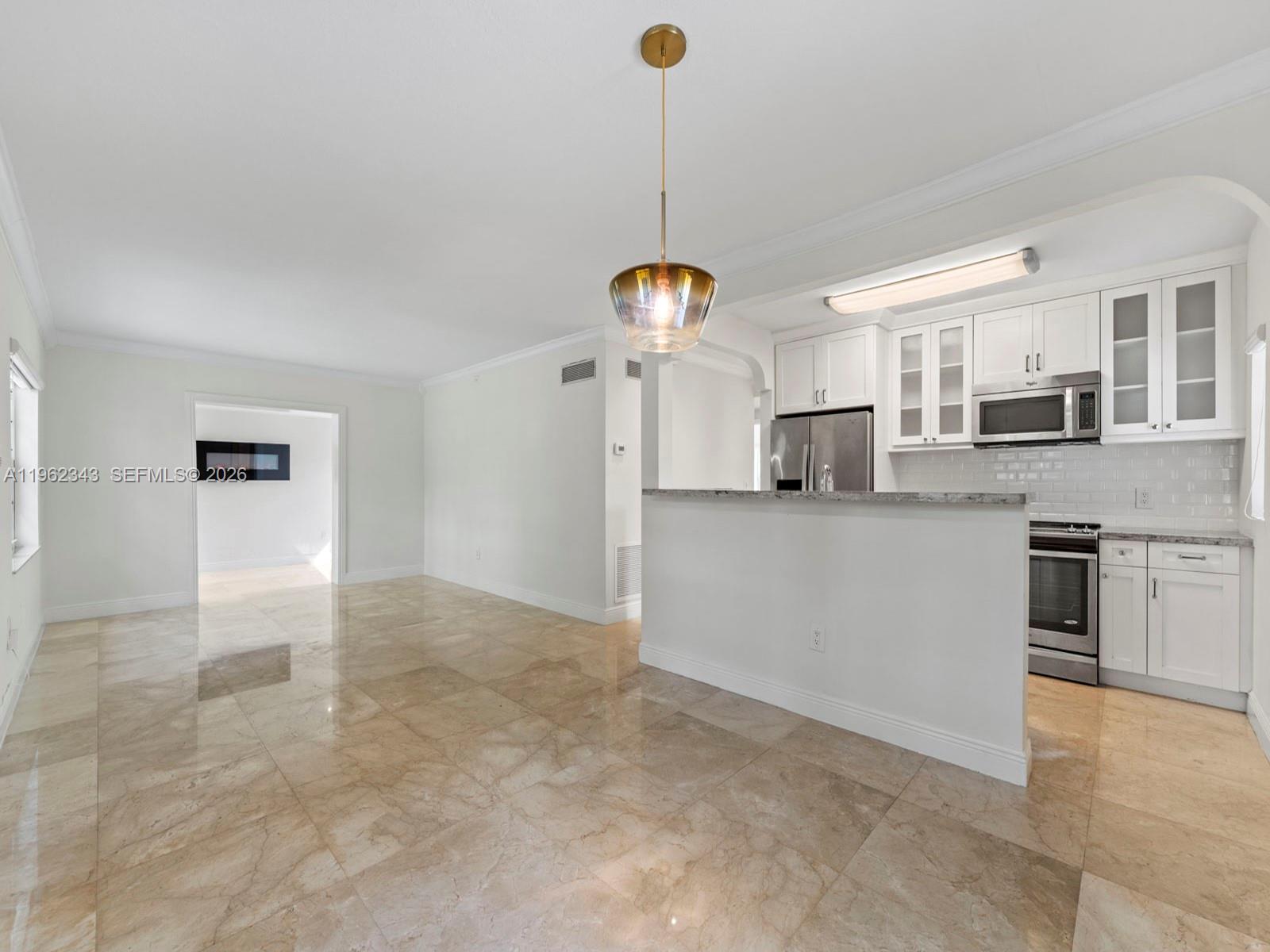 5940 Southwest 47th Street Miami, FL 33155 - Photo 15 of 53 a view of a kitchen with a sink