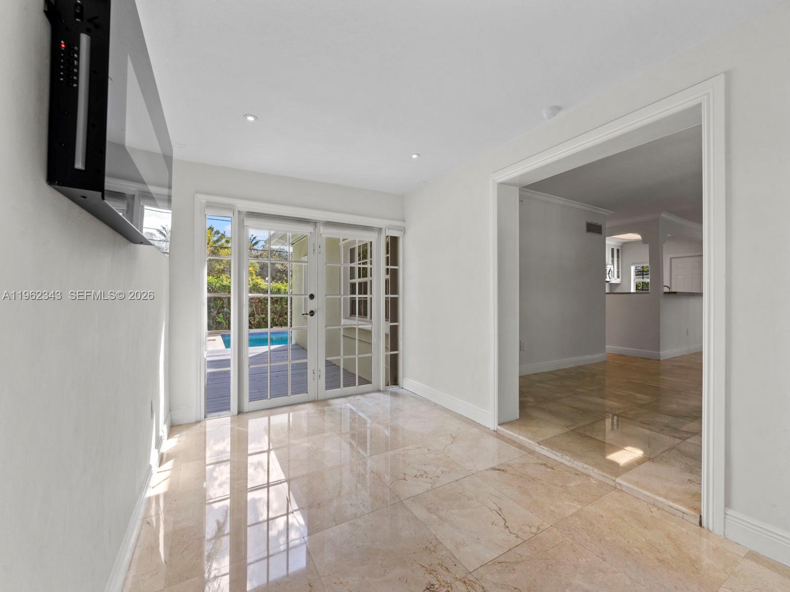 5940 Southwest 47th Street Miami, FL 33155 - Photo 28 of 53 a view of empty room with floor to ceiling window