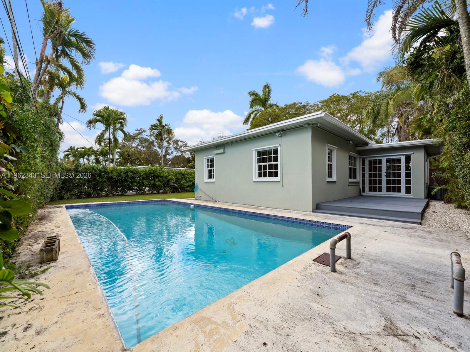 5940 Southwest 47th Street Miami, FL 33155 - Photo 42 of 53 a view of a house with swimming pool