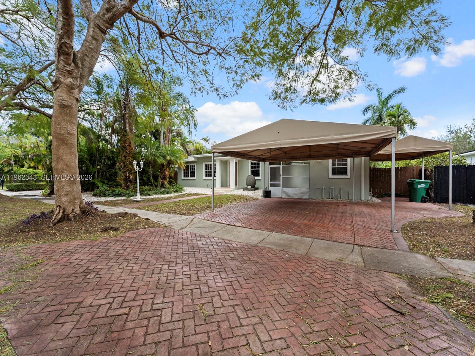 5940 Southwest 47th Street Miami, FL 33155 - Photo 53 of 53 a view of a house with a yard