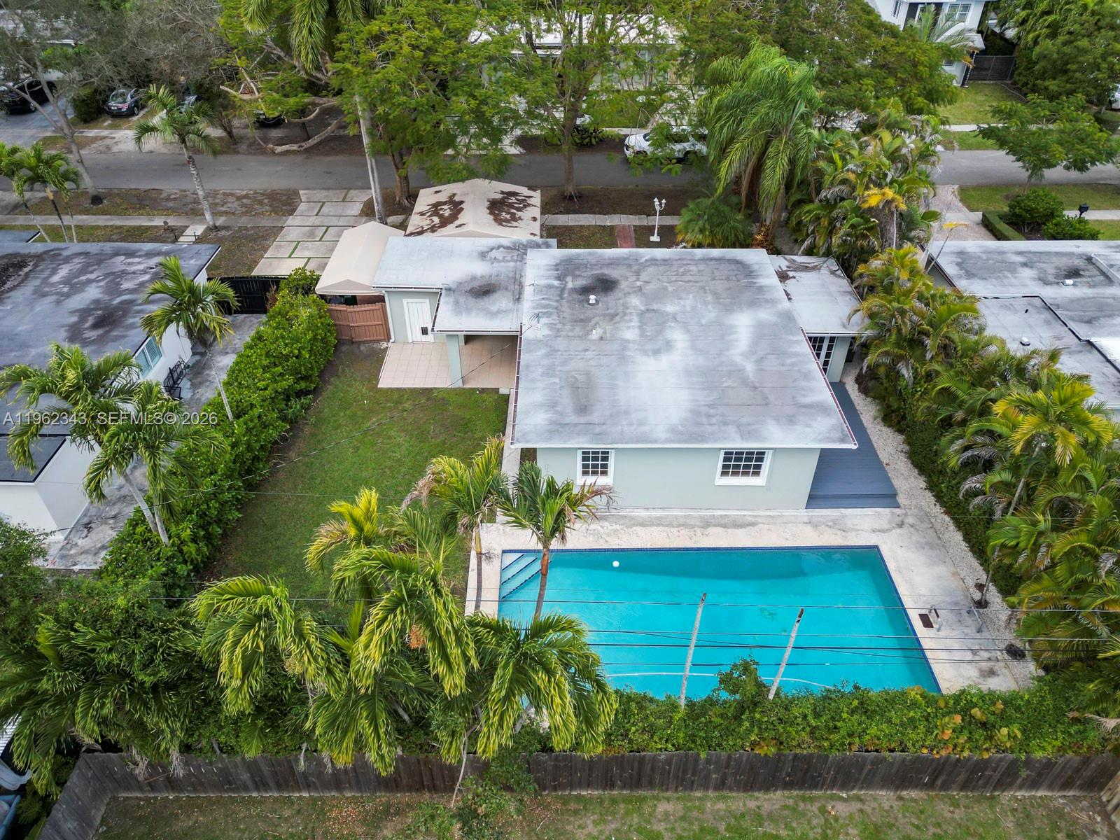5940 Southwest 47th Street Miami, FL 33155 - Photo 10 of 53 an aerial view of a house with a yard