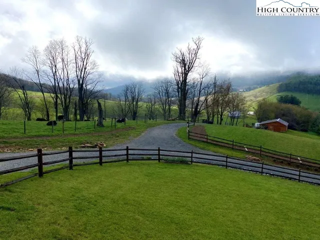 a view of a bench in a park