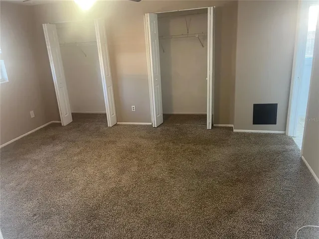 an empty room with closet