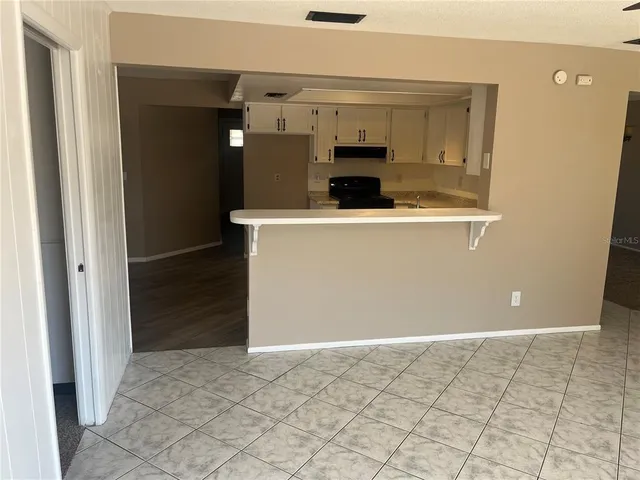 a view of kitchen and utility room