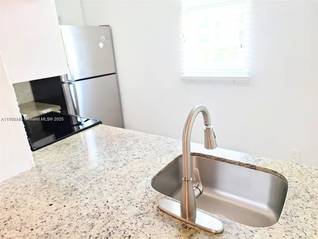 a view of hallway with closet