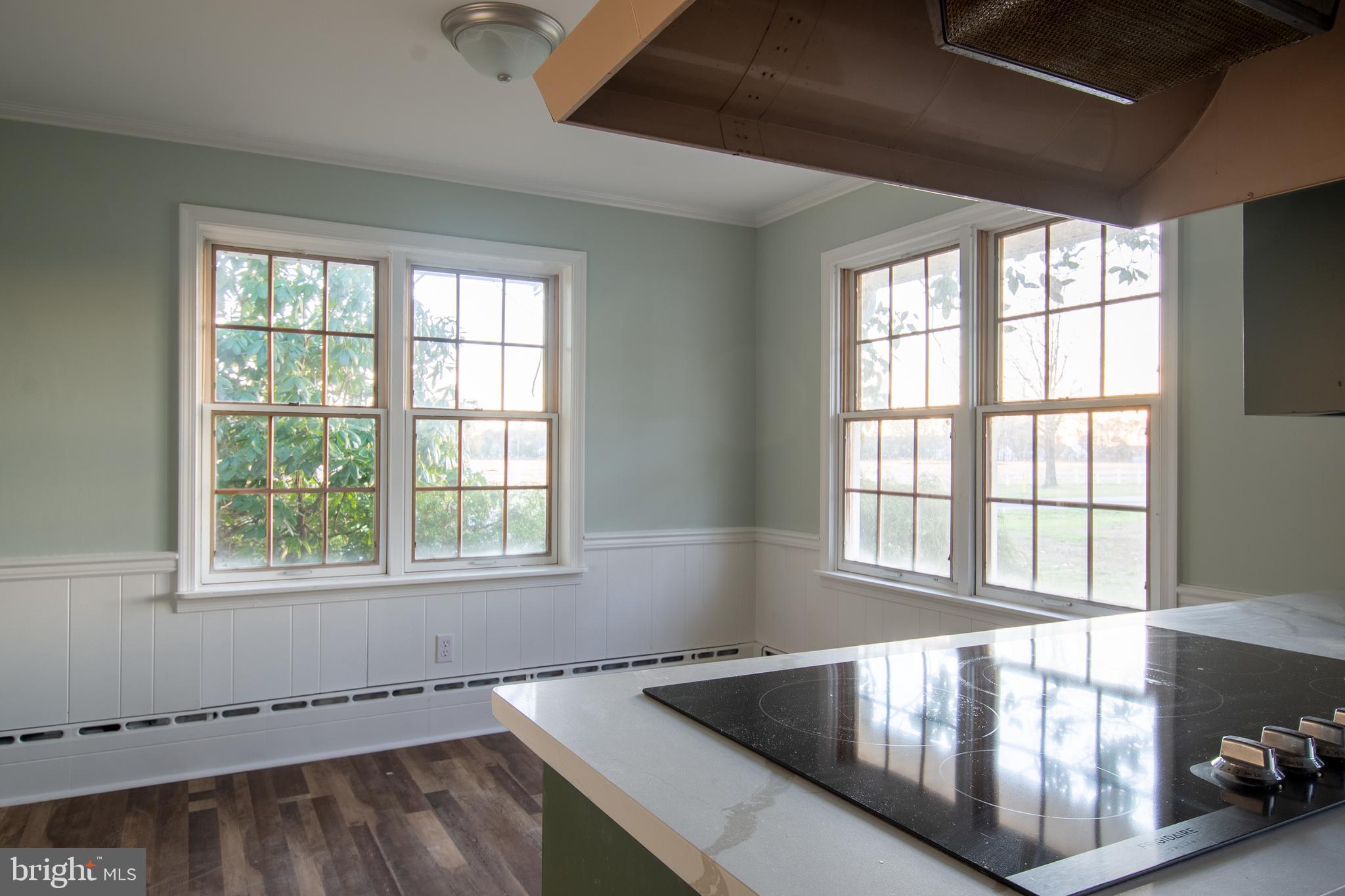 25165 Prettyman Road Georgetown, DE 19947 - Photo 19 of 43 a view of an empty room with wooden floor