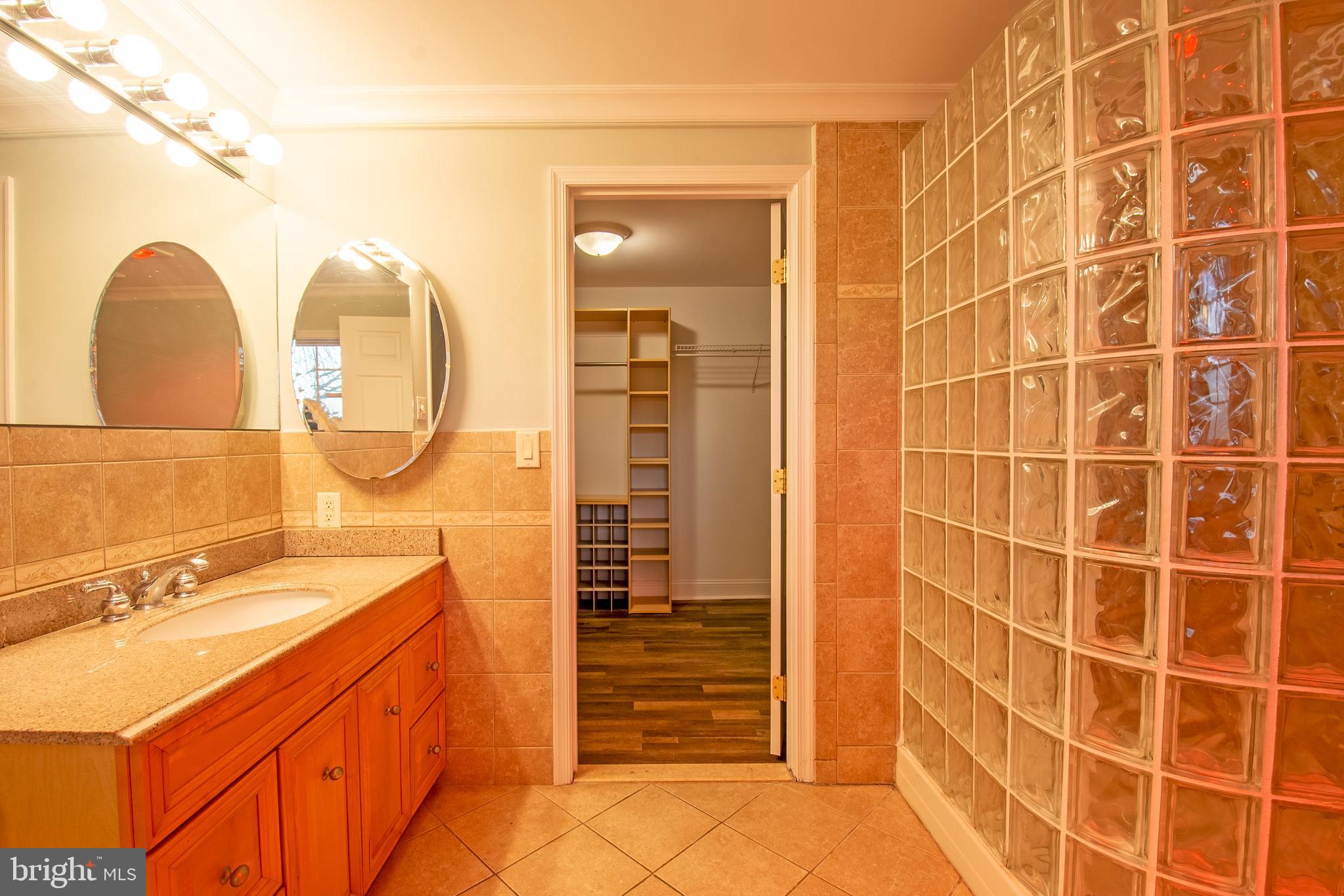 25165 Prettyman Road Georgetown, DE 19947 - Photo 29 of 43 a bathroom with a sink and a mirror