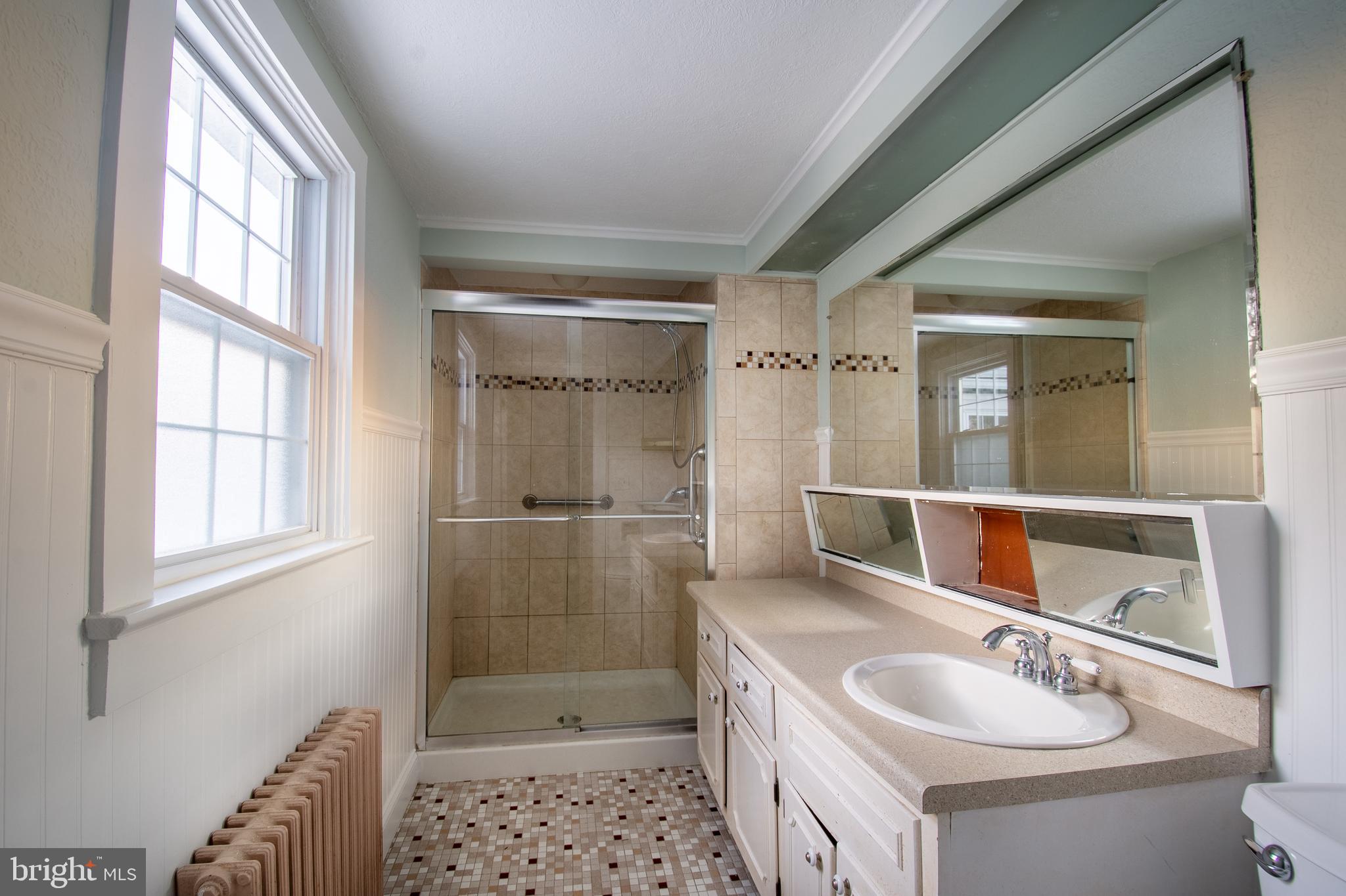 25165 Prettyman Road Georgetown, DE 19947 - Photo 37 of 43 a bathroom with a sink a toilet and shower