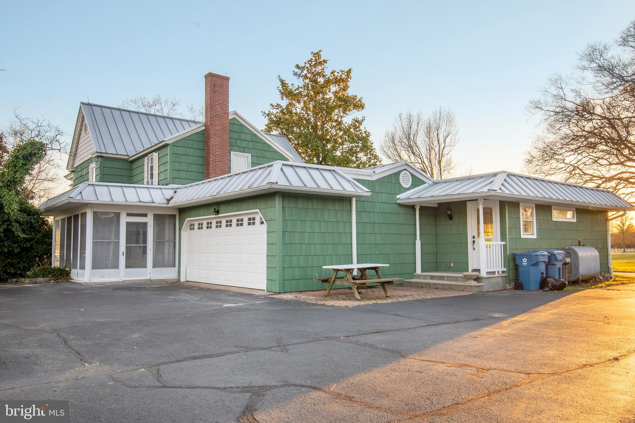 25165 Prettyman Road Georgetown, DE 19947 - Photo 6 of 43 a front view of a house with a garden