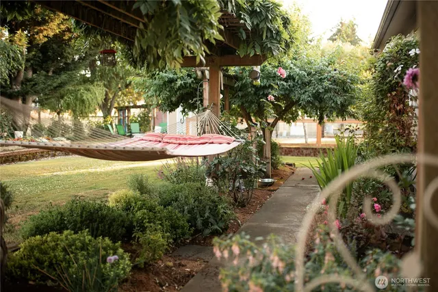 a view of a garden with an trees