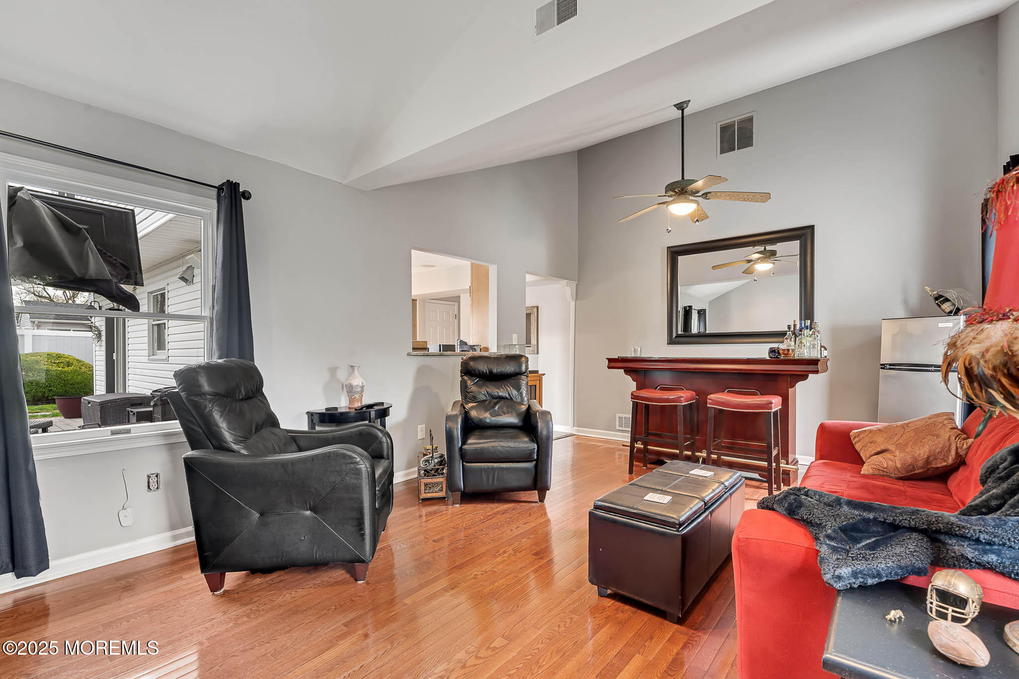 22 A Bedle Road Hazlet, NJ 07730 - Photo 12 of 32 a living room with furniture and a flat screen tv