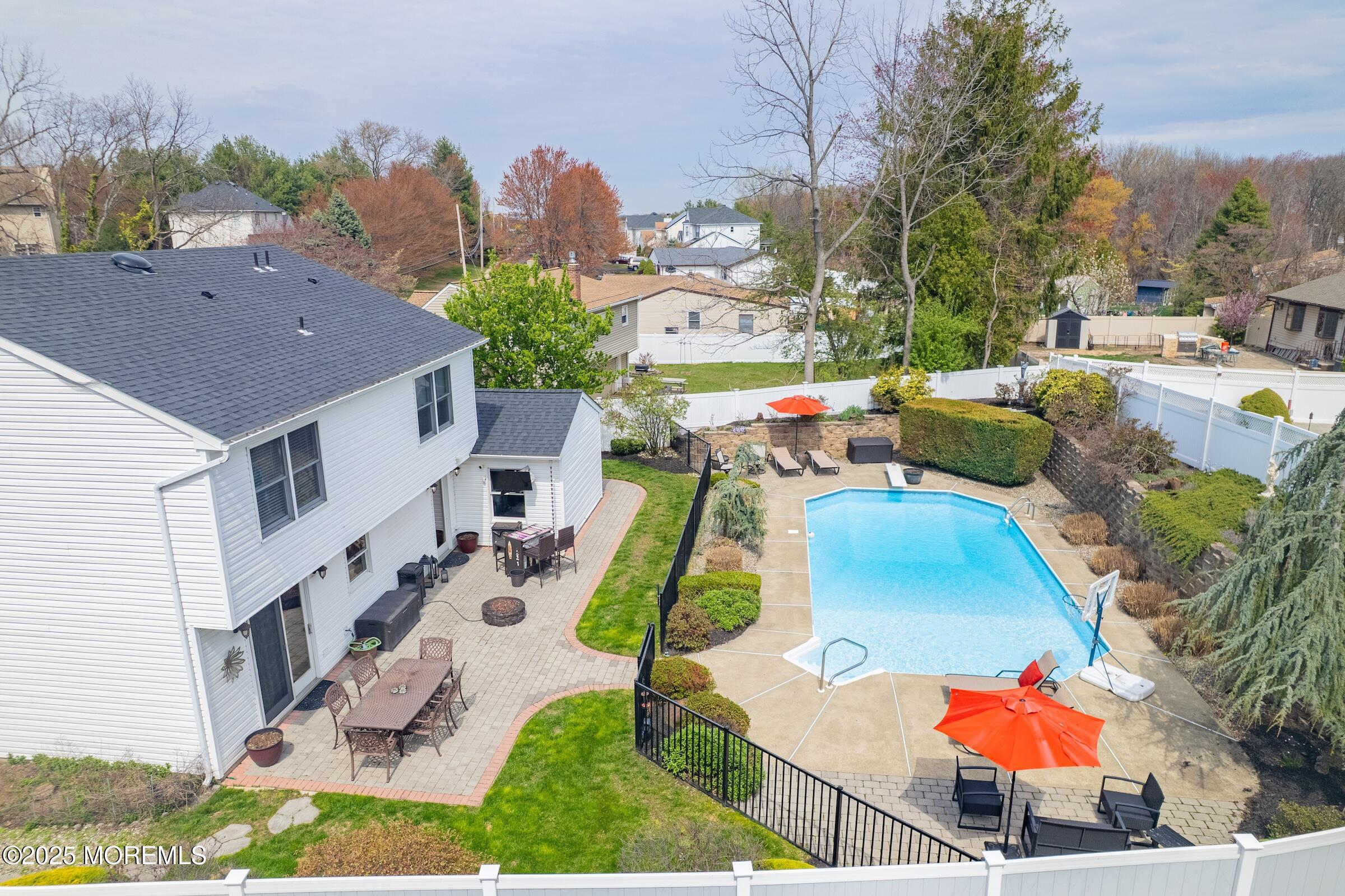 22 A Bedle Road Hazlet, NJ 07730 - Photo 25 of 32 an aerial view of a house with swimming pool and furniture