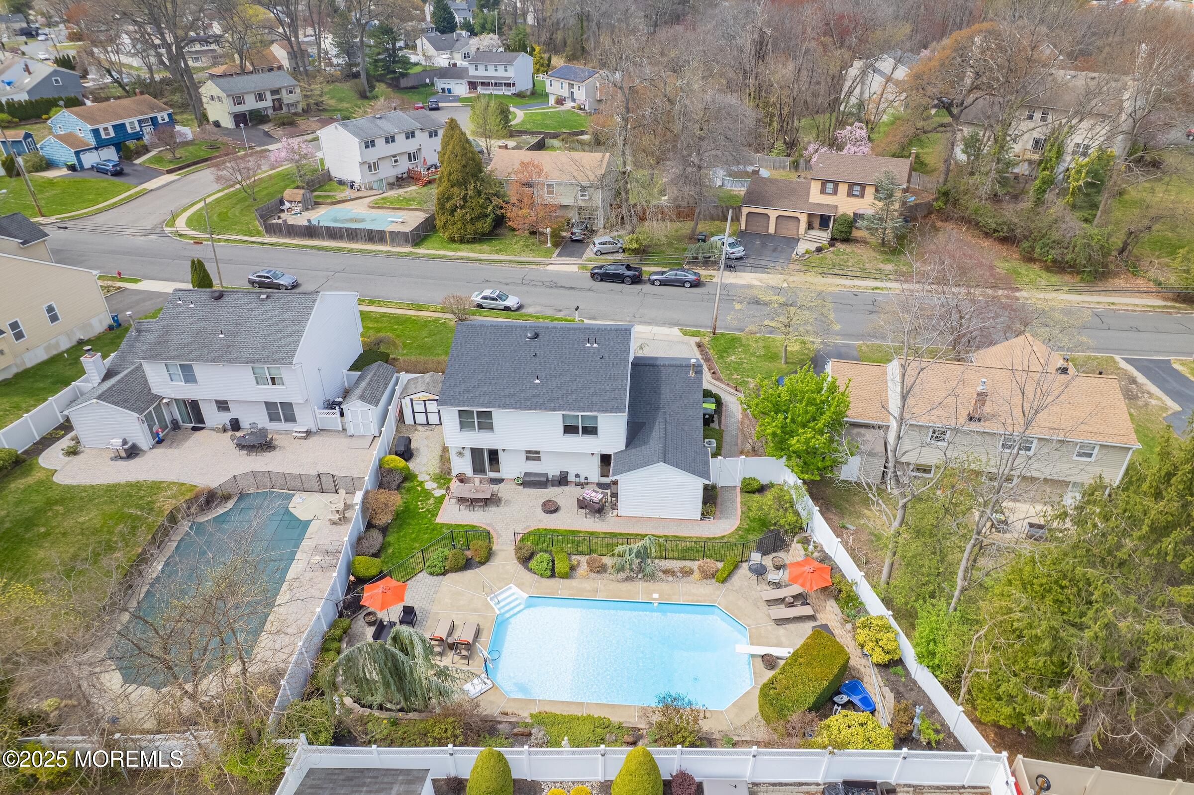 22 A Bedle Road Hazlet, NJ 07730 - Photo 26 of 32 an aerial view of a swimming pool with outdoor seating