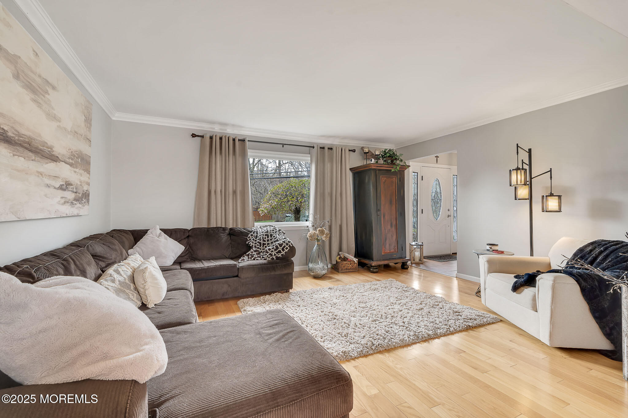 22 A Bedle Road Hazlet, NJ 07730 - Photo 5 of 32 a living room with furniture and a large window