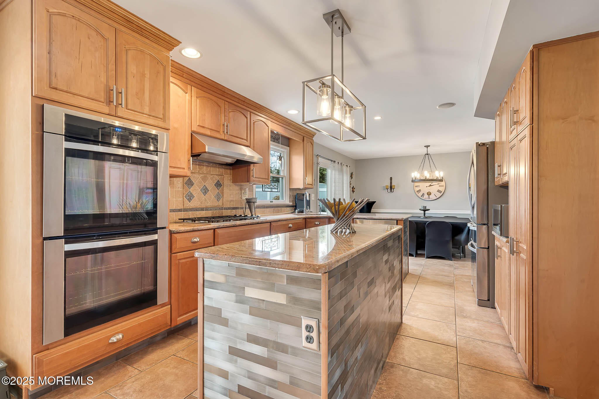 22 A Bedle Road Hazlet, NJ 07730 - Photo 9 of 32 a kitchen with stainless steel appliances granite countertop a sink and cabinets