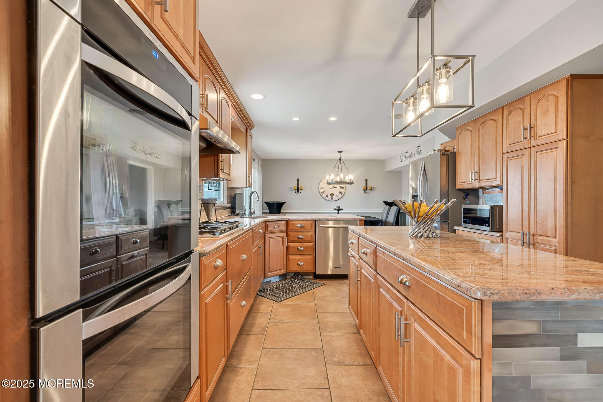 22 A Bedle Road Hazlet, NJ 07730 - Photo 10 of 32 a large kitchen with stainless steel appliances lots of counter space and a sink