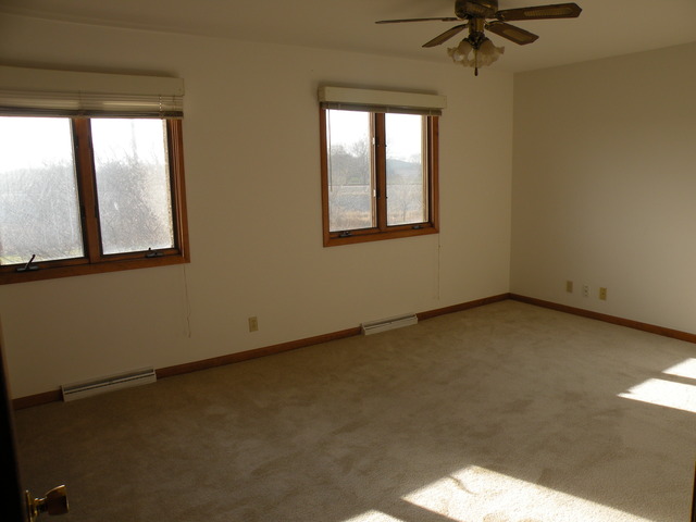 250 Circlegate Road, Unit 250 New Lenox, IL 60451 - Photo 15 of 25 an empty room with a window