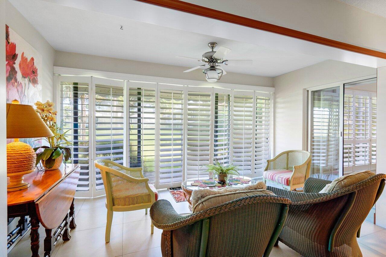 3677 Quail Ridge Drive, Unit BOBWHITE B Boynton Beach, FL 33436 - Photo 10 of 47 a view of a dining room with furniture and windows