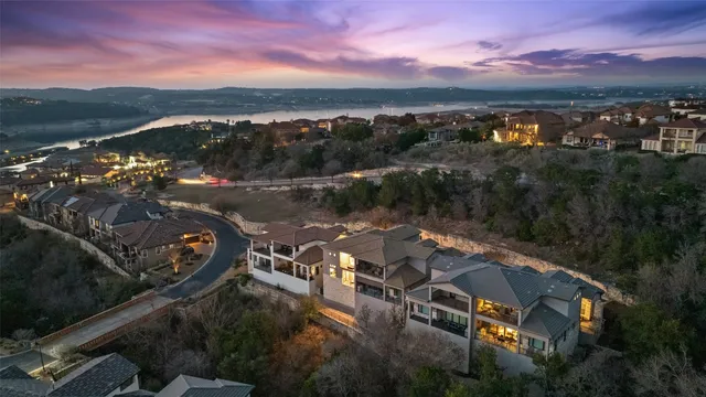 an aerial view of a house with a garden space