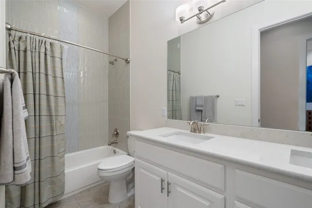 an aerial view of a house with a garden