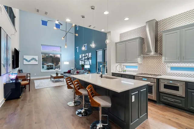 an aerial view of a house with a lake view