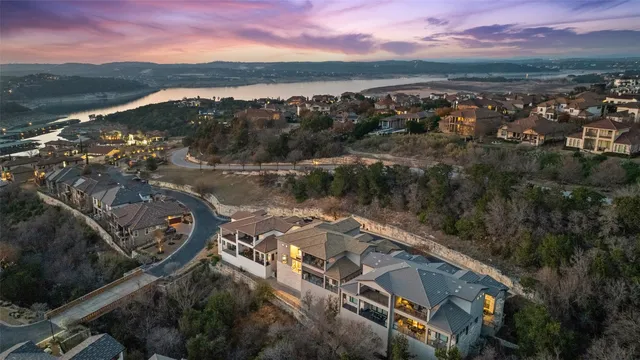 a view of a kitchen with a table and chairs