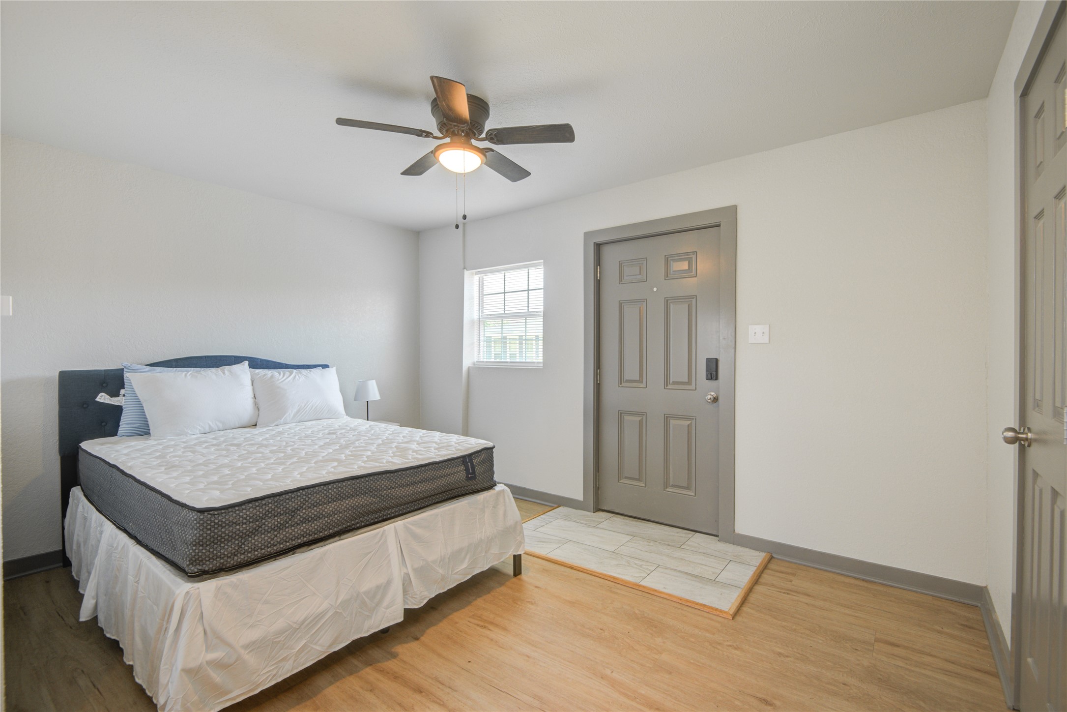 208 West 2nd Street Sweeny, TX 77480 - Photo 3 of 12 a bedroom with a bed and window