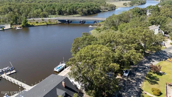 a view of balcony and yard