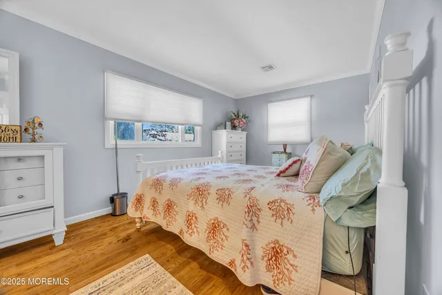 a bedroom with a bed and a cabinets