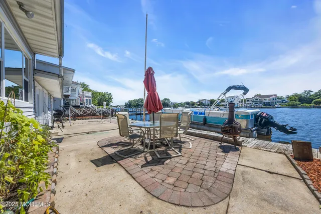 a view of a terrace with furniture