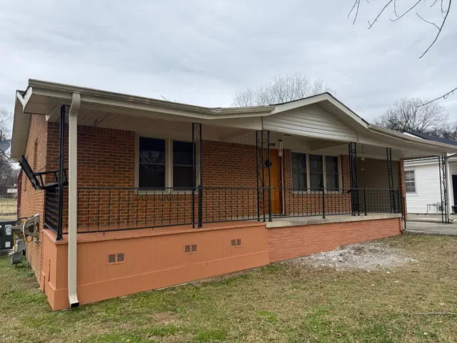 a front view of a house with garage