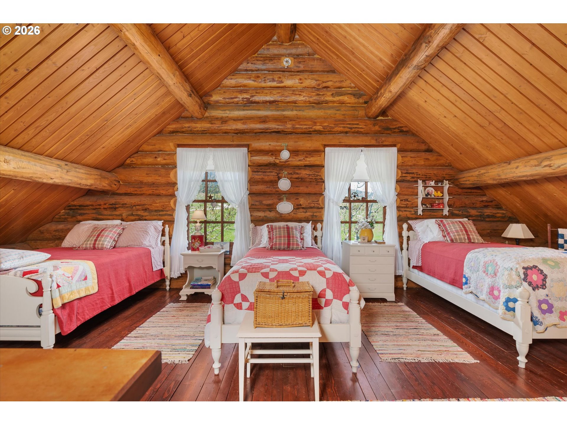 64782 Alder Slope Road Enterprise, OR 97828 - Photo 33 of 48 a bed room with a bed window and a chair