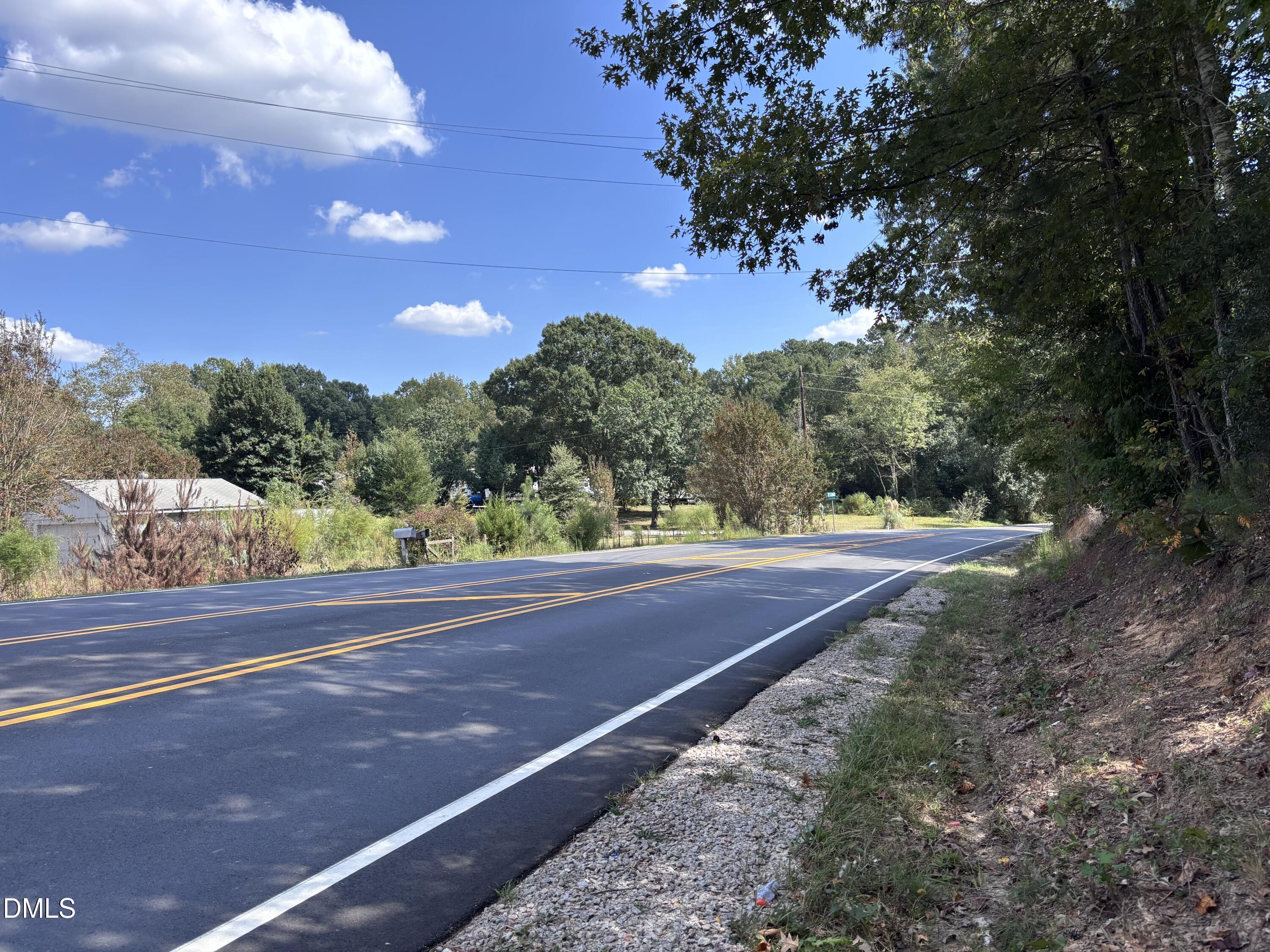 3007 South Smithfield Road Knightdale, NC 27545 - Photo 11 of 68 a view of a yard with a house