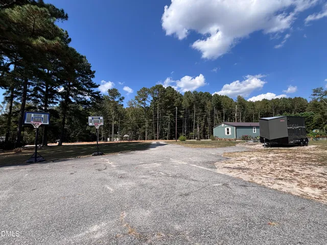 a view of road with trees