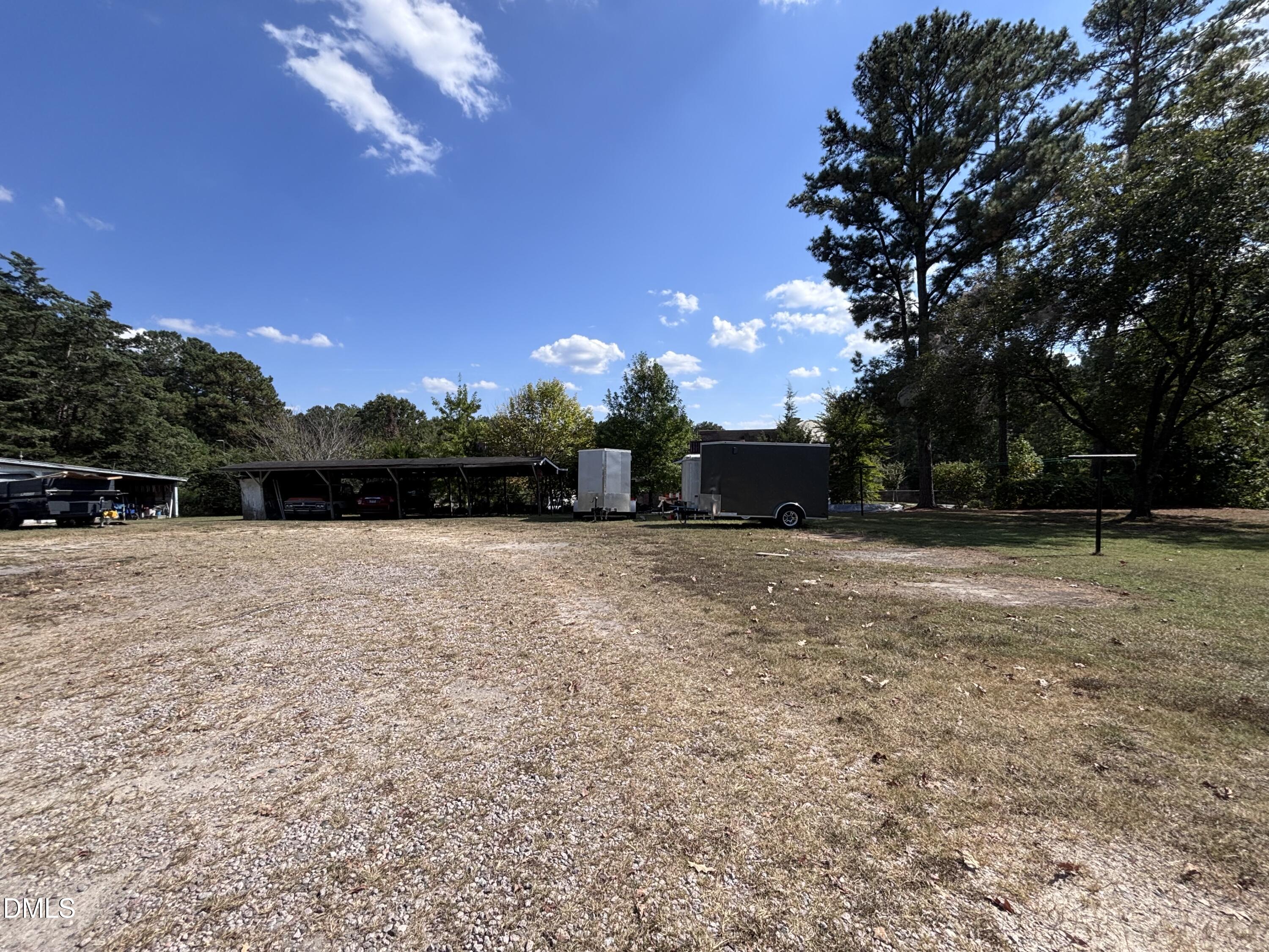 3007 South Smithfield Road Knightdale, NC 27545 - Photo 16 of 68 a view of outdoor space with deck and yard