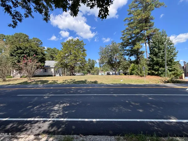 a view of road and trees