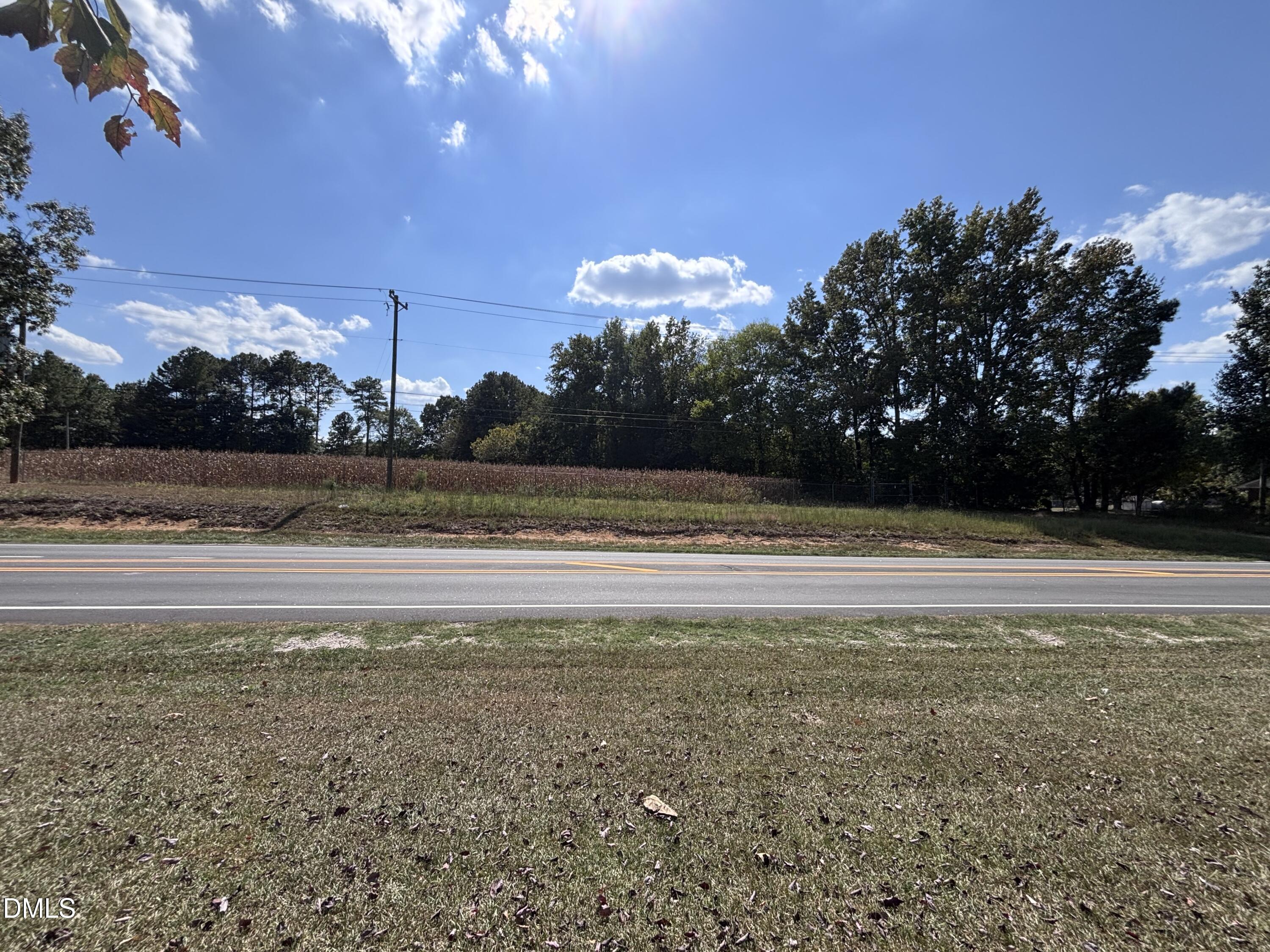3007 South Smithfield Road Knightdale, NC 27545 - Photo 31 of 68 a view of swimming pool with outdoor seating and yard in back