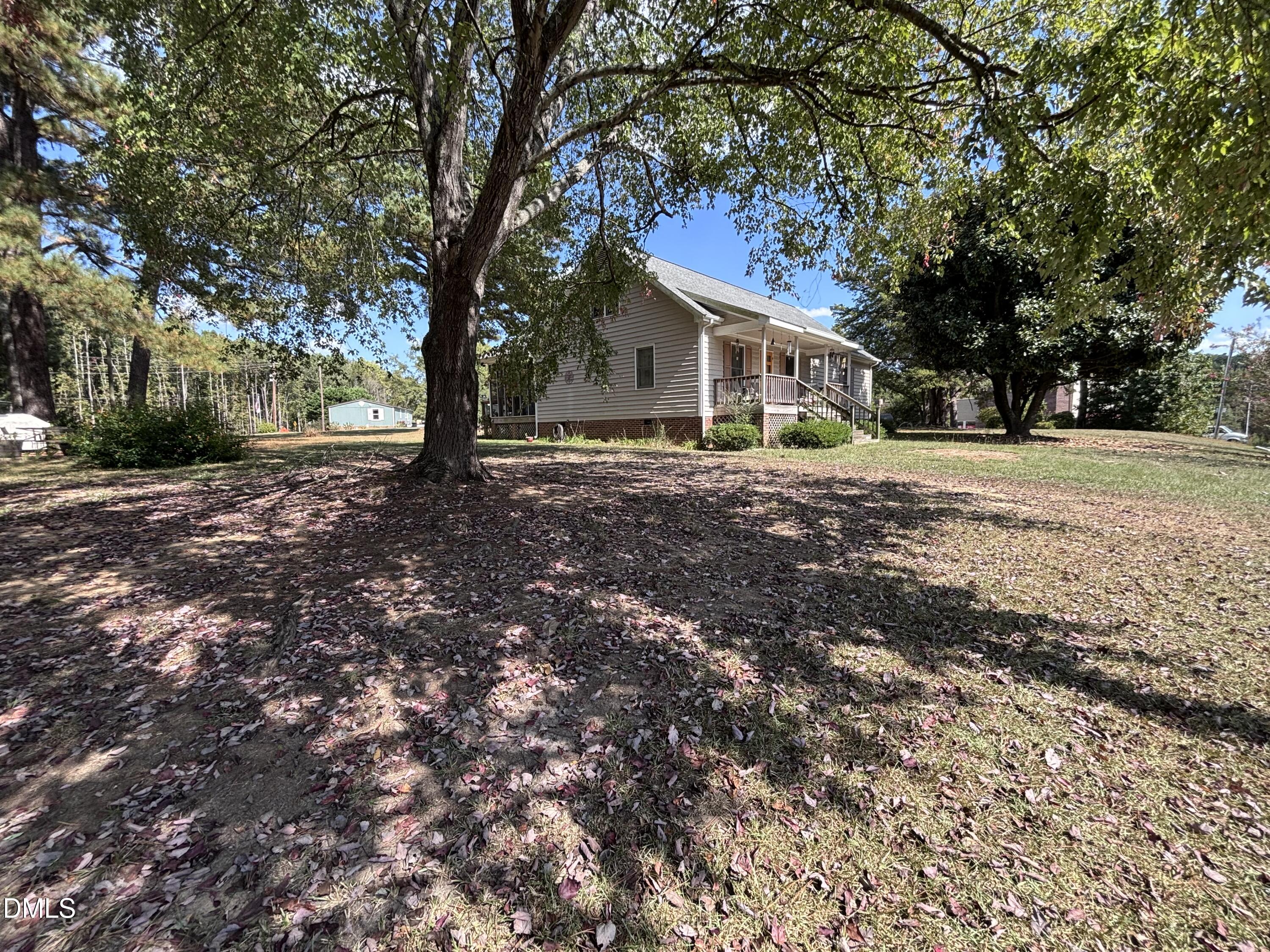 3007 South Smithfield Road Knightdale, NC 27545 - Photo 34 of 68 a big tree in middle of the garden
