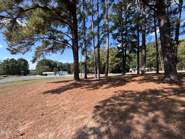 a view of road with trees