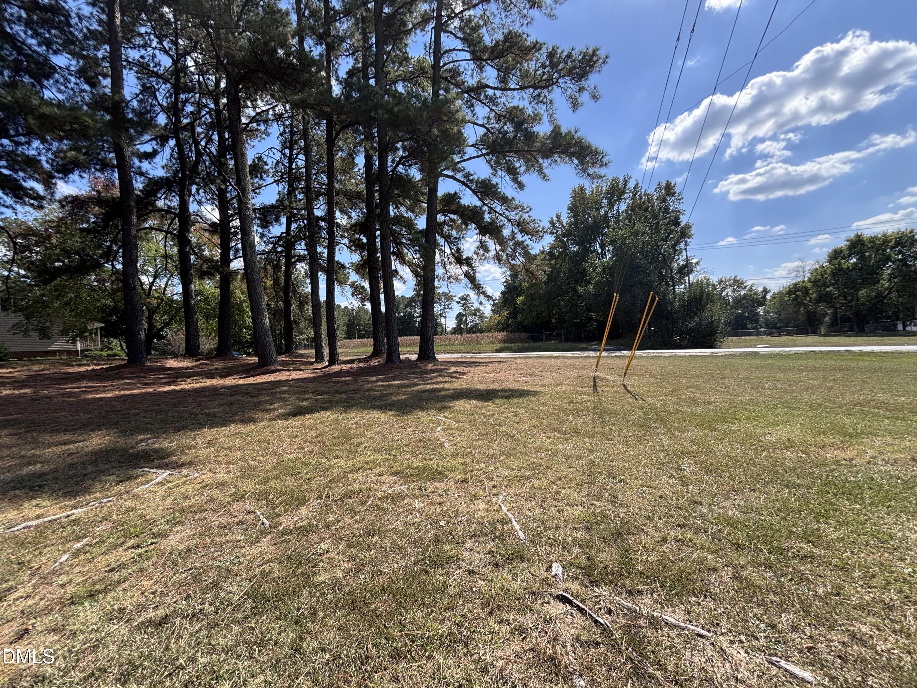 3007 South Smithfield Road Knightdale, NC 27545 - Photo 47 of 68 a view of a tennis ground with large trees