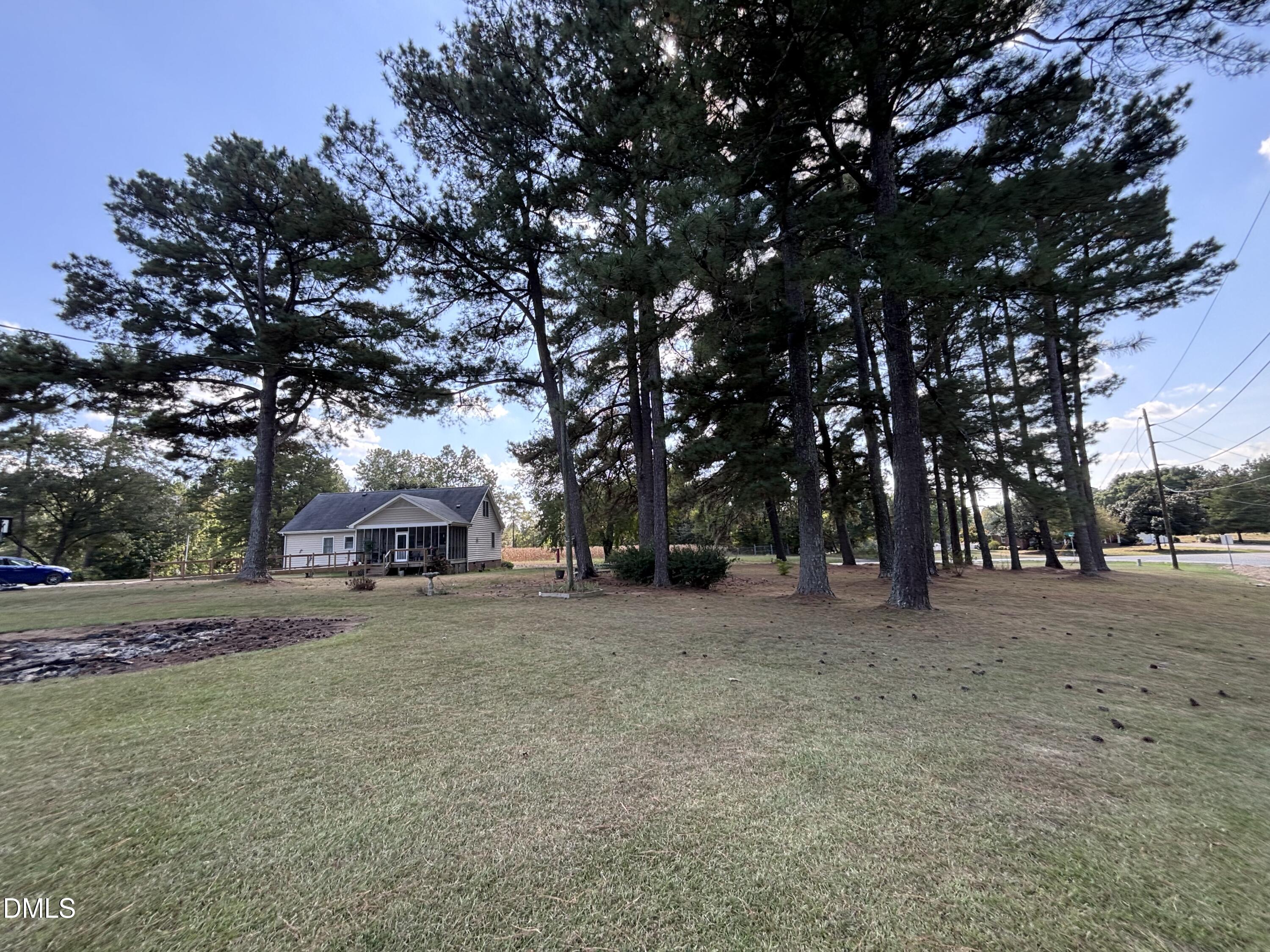 3007 South Smithfield Road Knightdale, NC 27545 - Photo 61 of 68 a view of a tree in front of a house